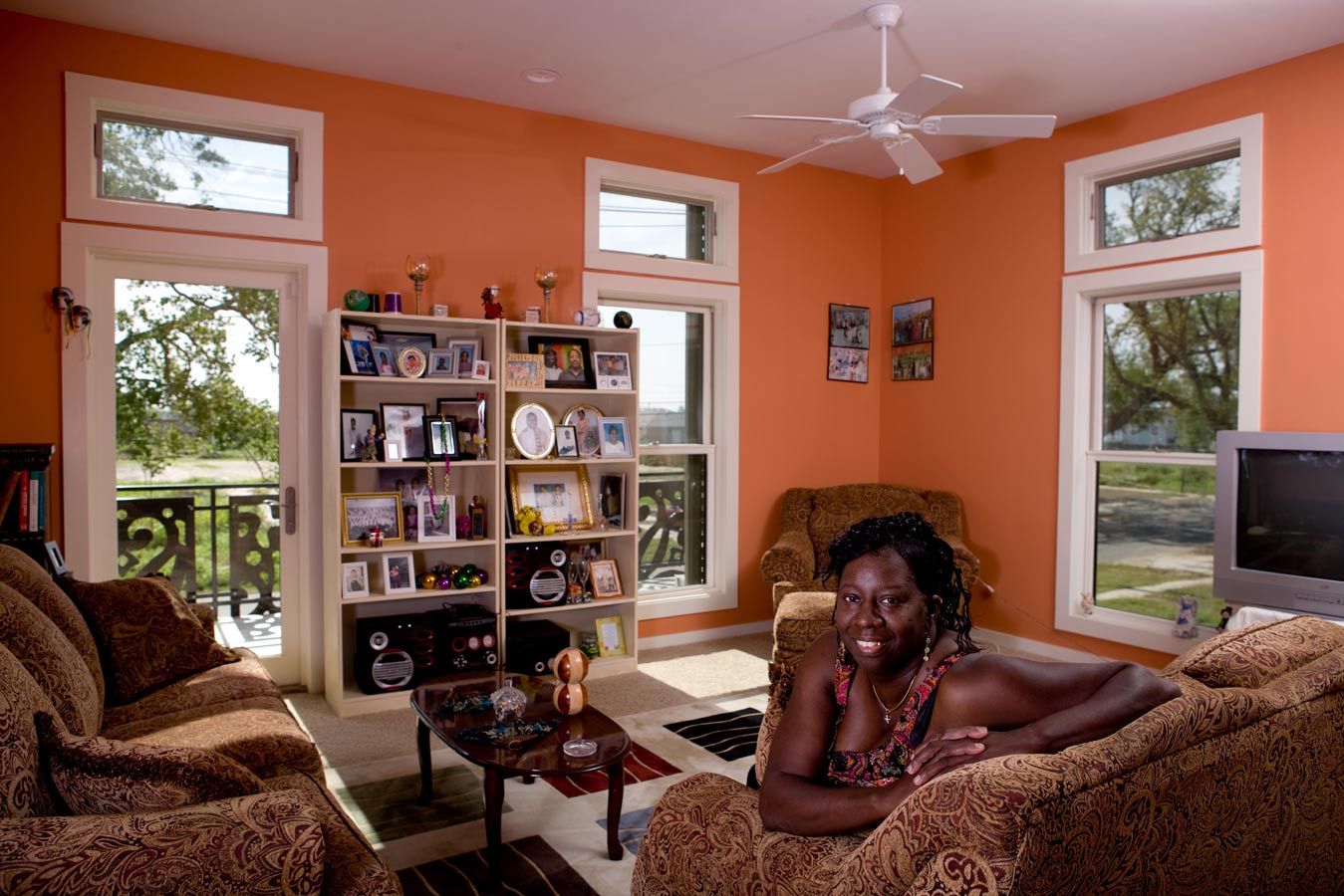 <p>Melba Barnes, the first owner of a KieranTimberlake house in the Lower Ninth Ward, in her completed home on Tennessee Street. Barnes lost her previous home in Hurricane Katrina. <br><small>&copy; Alexei Lebedev/Momenta</small></p>
