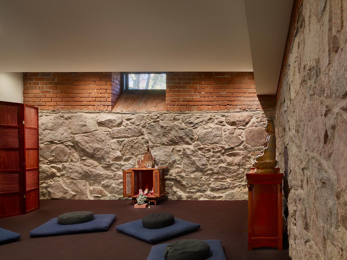 <p>The meditation room is a quiet space enclosed by the original walls of the crypt. <br><small>&copy; Halkin Photography LLC</small></p>